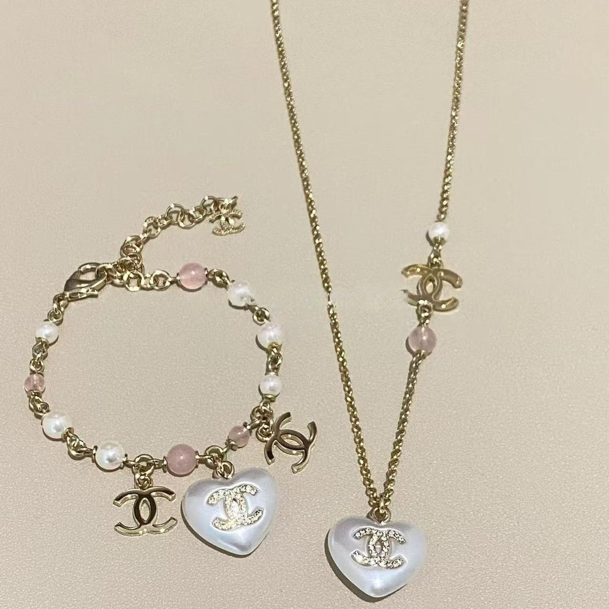 Chanel Pearl Heart Necklace Bracelet Earrings