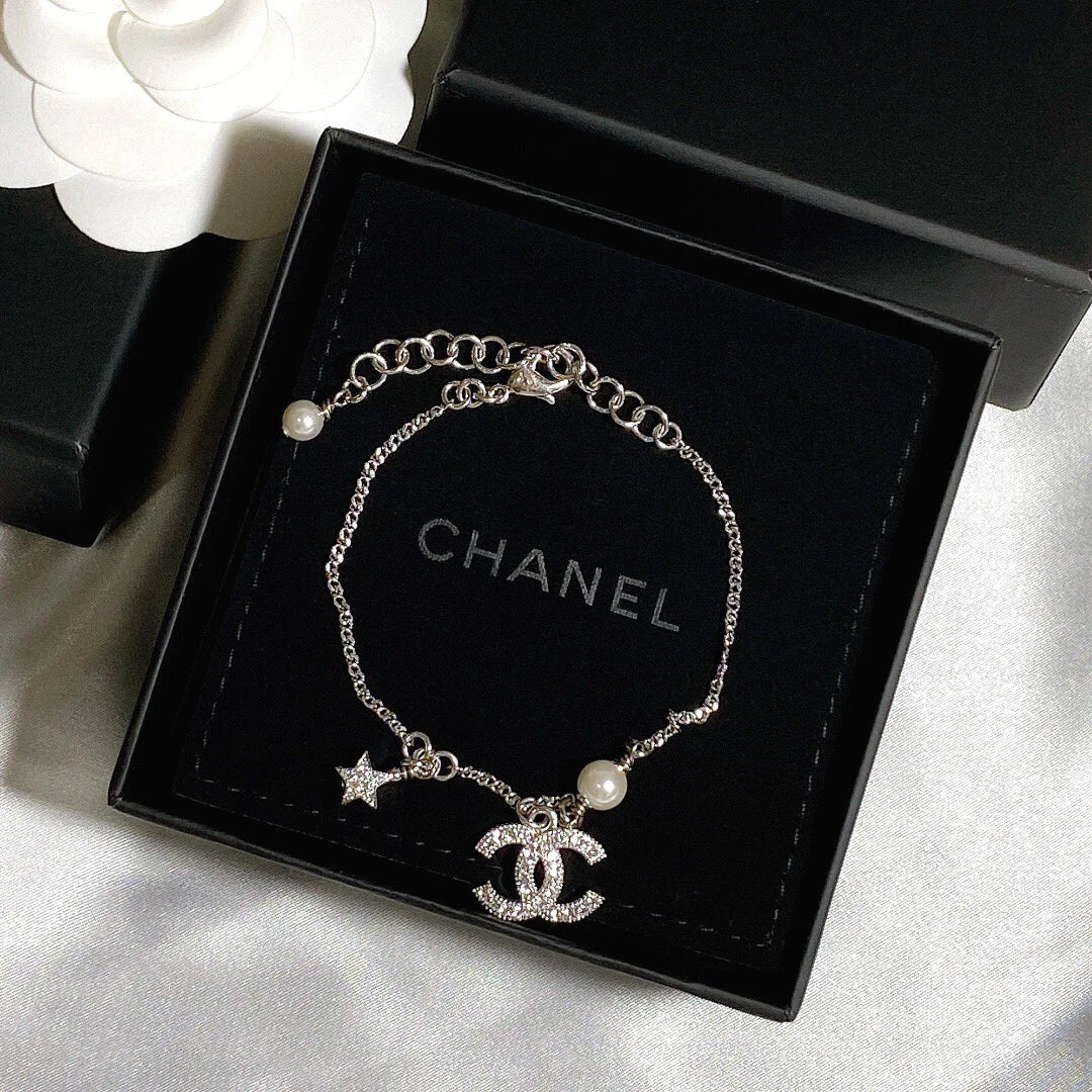 Chanel Silver Star Diamond Necklace Bracelet